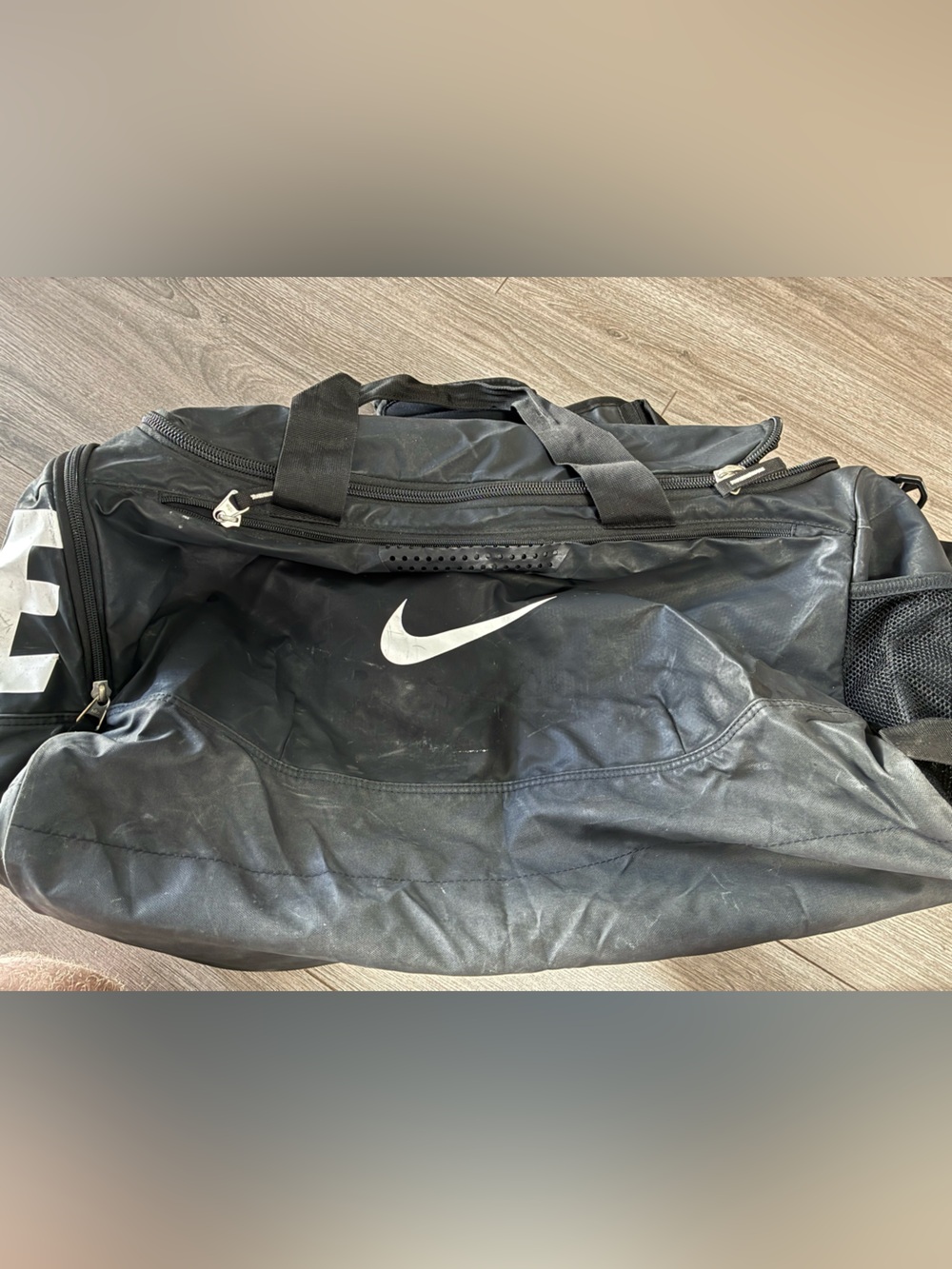 Nike Black Duffel Bag with White Swoosh